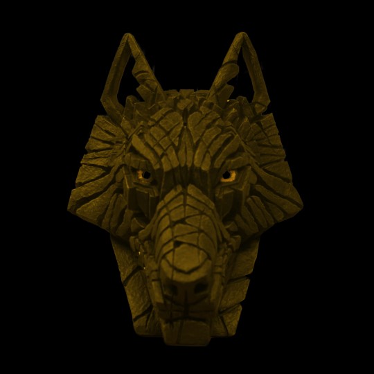 Gold wolf head sculpture
